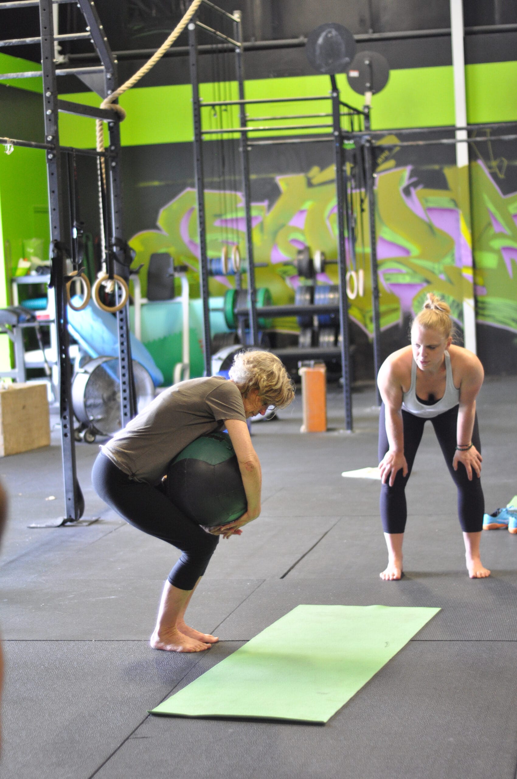 older_woman_lapping_medicine_ball